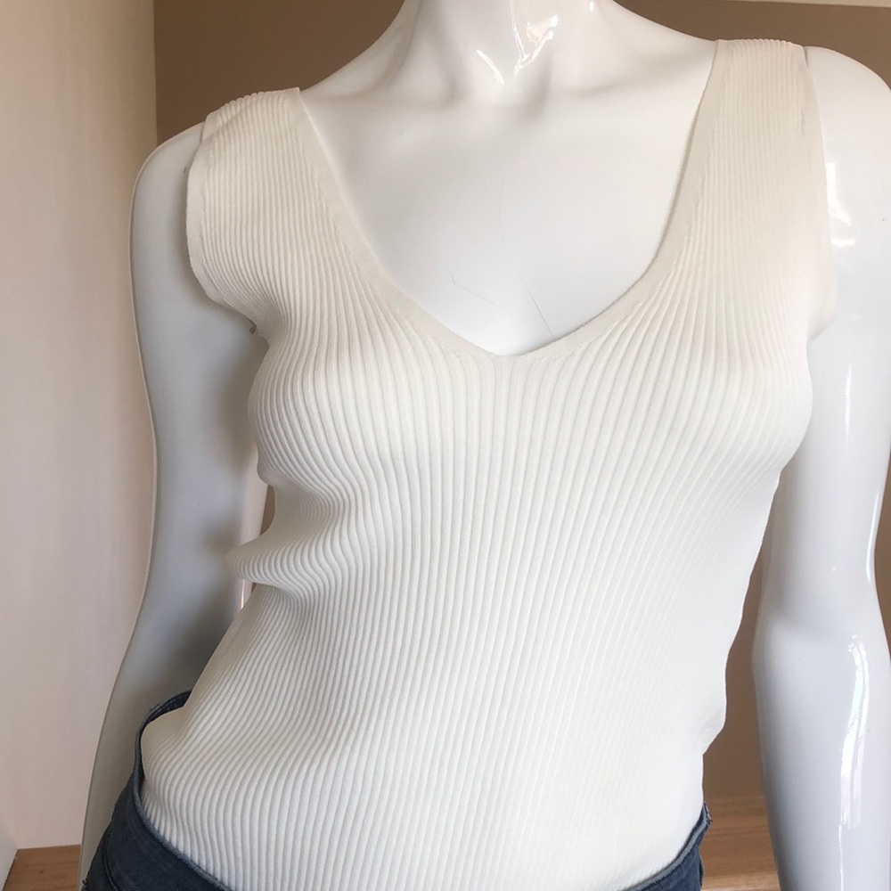Ivory ribbed knit sleeveless deep v-neck bodysuit